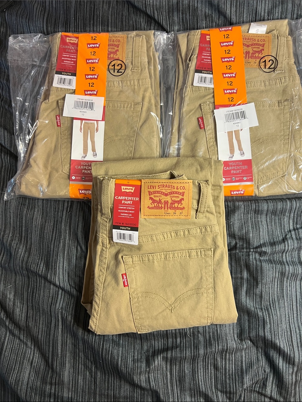 Levi’s carpenter pants, khaki boys size 12. Three pairs.